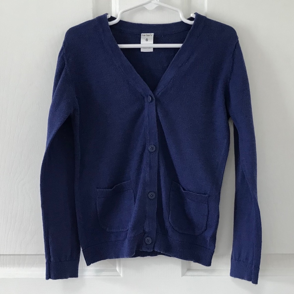 Carter’s blue four buttoned Cardigan in Girls Size 6 long sleeved pockets